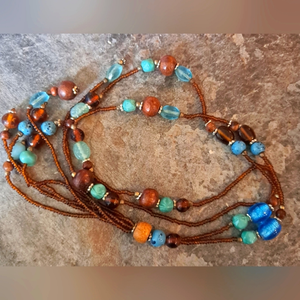 Collection of two handmade necklace and five pairs of earrings. Seed beads.